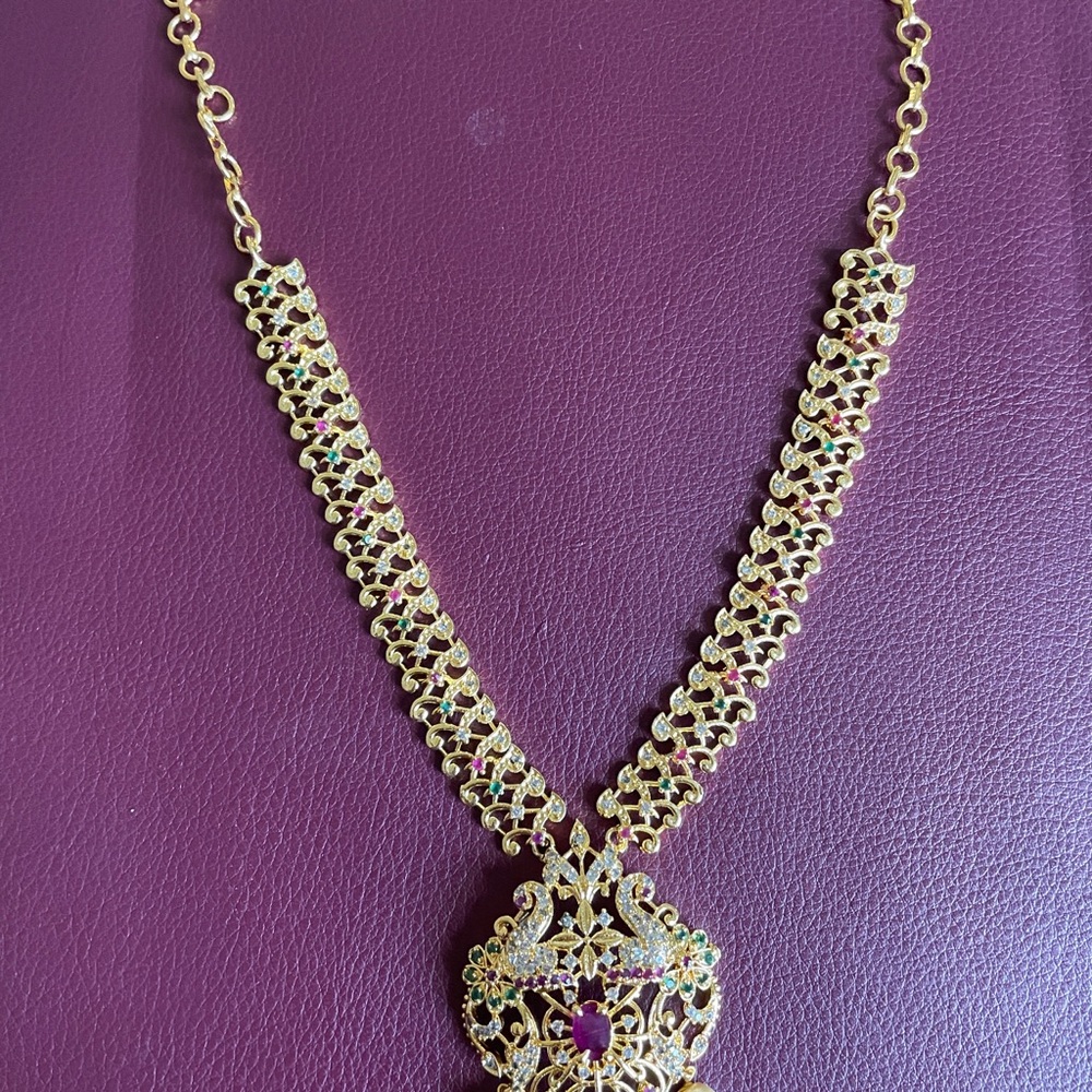 Gold-Tone Filigree Pendant Necklace with Ruby Accent